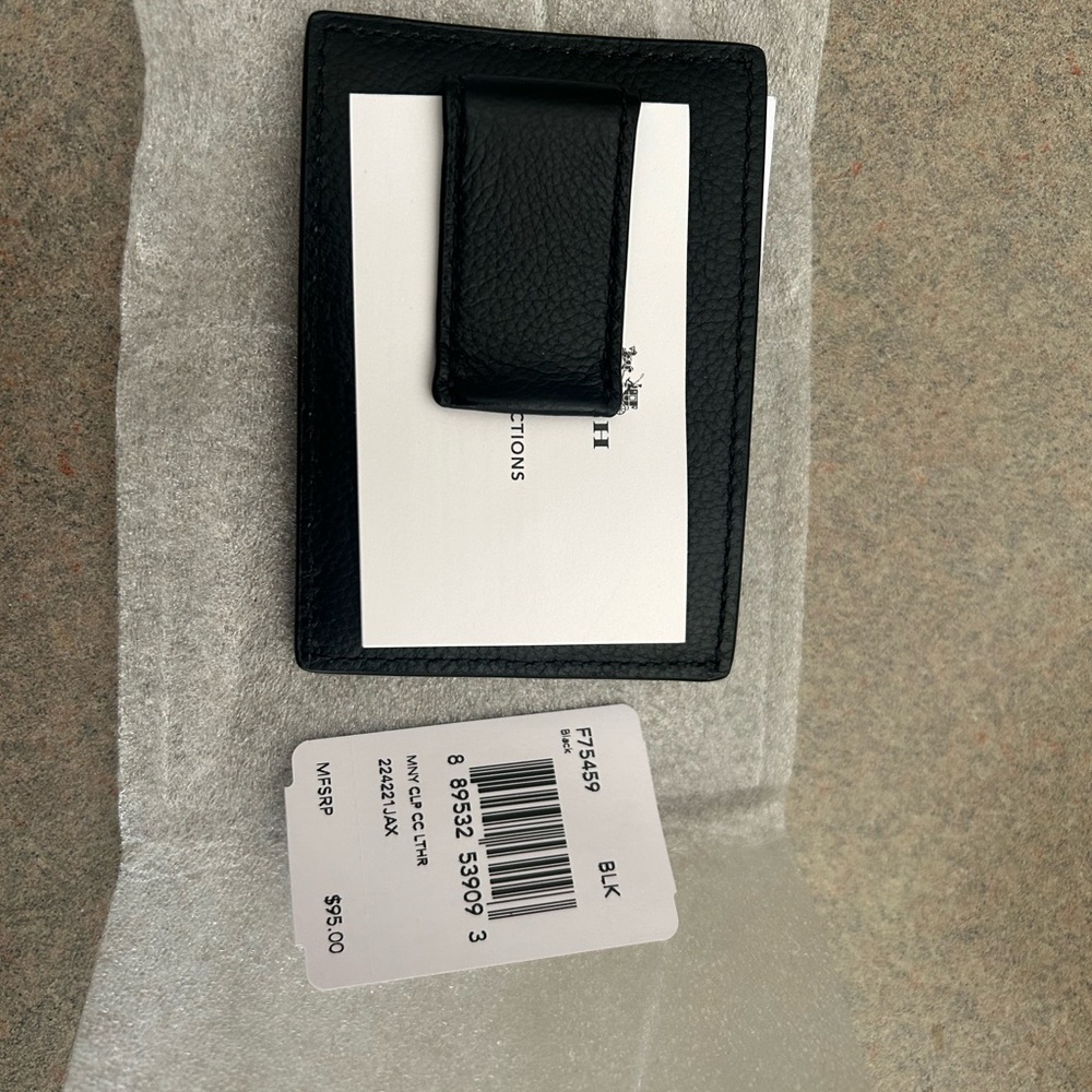 Men’s black wallet/money clip from Coach! NWT but the style is a a few years old